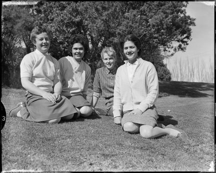 "Golfers Relax in Sunshine" at Junior Girls' Golf Tournament