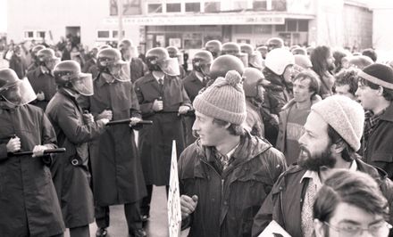 Protesters challenge police lines