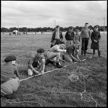 "Scouts In A Hurry To Erect Flagpole"