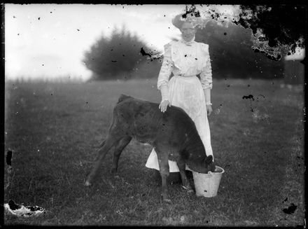 Woman with Calf