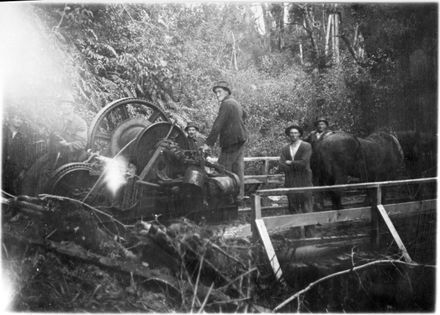 Workers with a steam driven 'log-hauler' in the bush