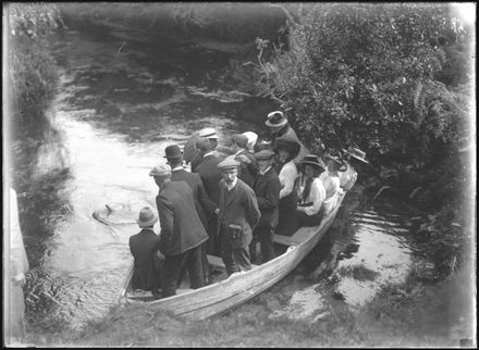 Large Group of People in Small Boat