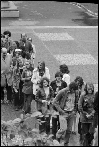 Four Young Girls Wait to Add Their Contribution