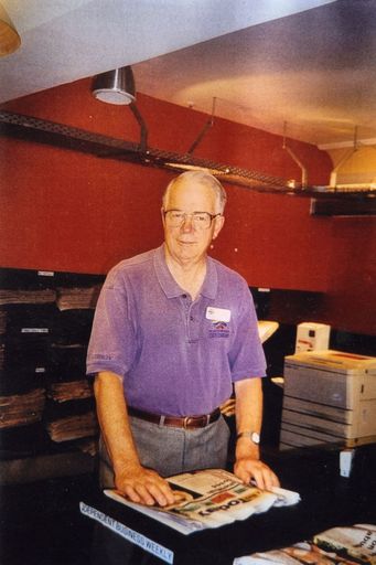 John Collins in the Newspaper Room, Palmerston North City Library