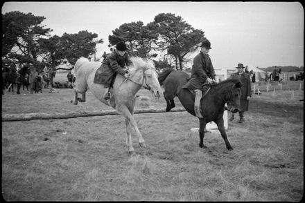 Children Jumping Horses