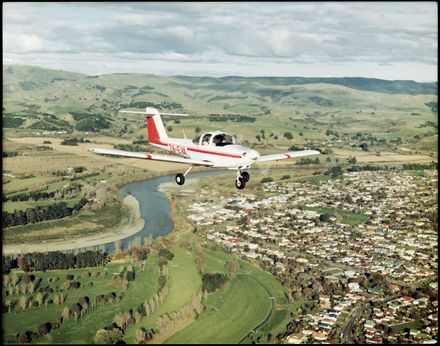 ZK-EVA Piper Tomahawk PA38 ZK-EVA  flying over Fitzroy Bend - Resource cover image