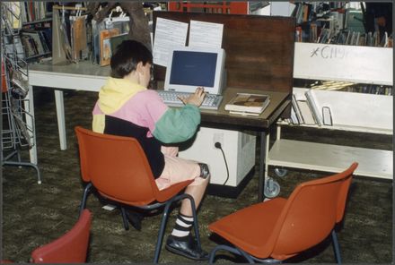 Child on computer the Palmerston North Public Library