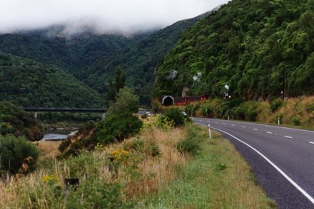 Train exiting tunnel by the Ballance Bridge