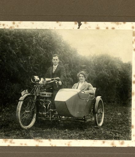 Couple on Motorcycle with Sidecar