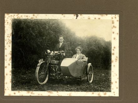 Couple on Motorcycle with Sidecar
