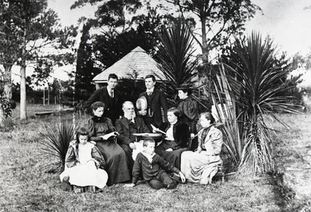 John Tiffin Stewart and his family in a garden
