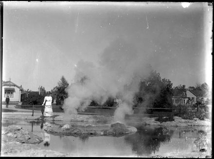 Woman Standing in Behind Thermal Pool