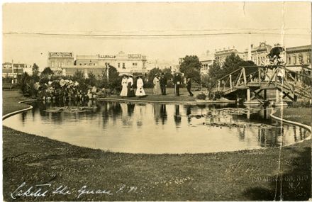 People beside The Lakelet in The Square 1