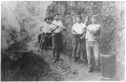 Workers clearing slip in Manawatu Gorge