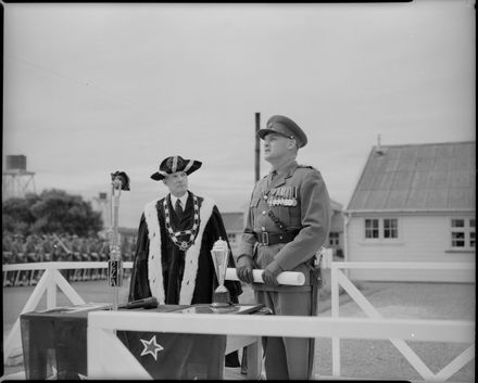 The Mayor and a Senior Officer standing on a Platform during the Linton Freedom of the City Parade