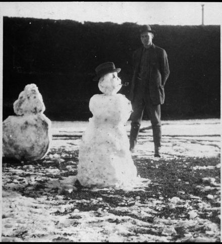 Unidentified man with snowmen - Resource cover image