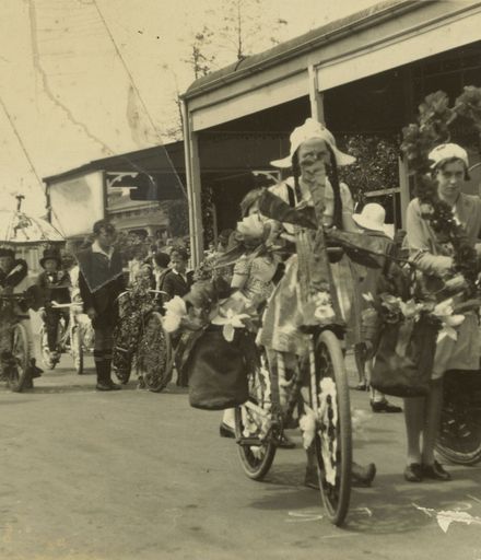 Children with decorated bicycles in Royal Show procession