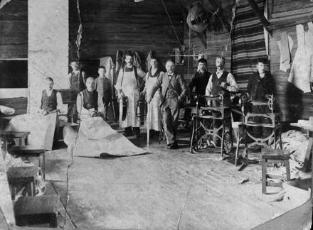 Workers inside Charles Dahl's canvas factory