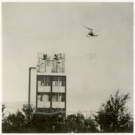 2021P_LionBreweries2-6-1_036069_004 - Helicopter Used in Installation of Standard Brewery Sign