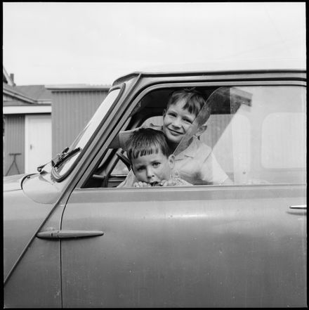 Two children in a car - Resource cover image