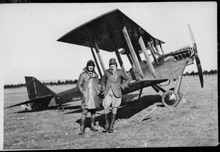 Captain Russell and H E Hibbard with Walsh Brothers DH6 aeoplane, Dannevirke