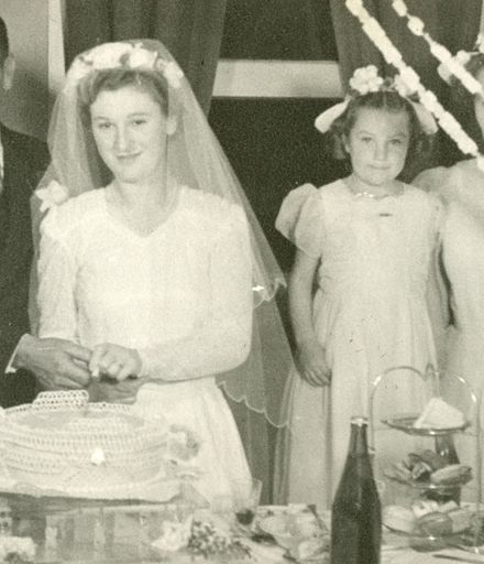 Cutting the cake at Barbara and Tom O'Grady's wedding