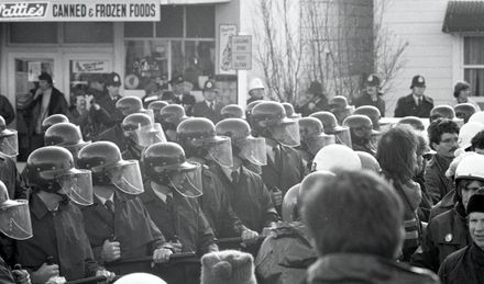 Protesters challenge police lines