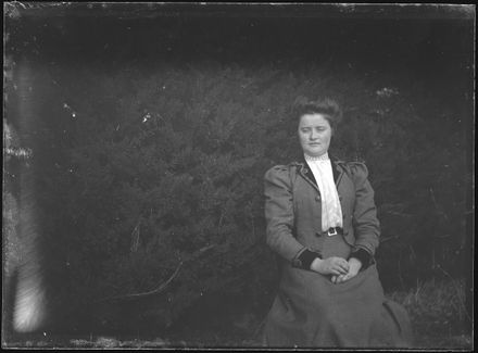 Woman Seated By Tree