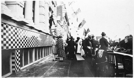 Watching the Procession from the Balcony of the Club Hotel