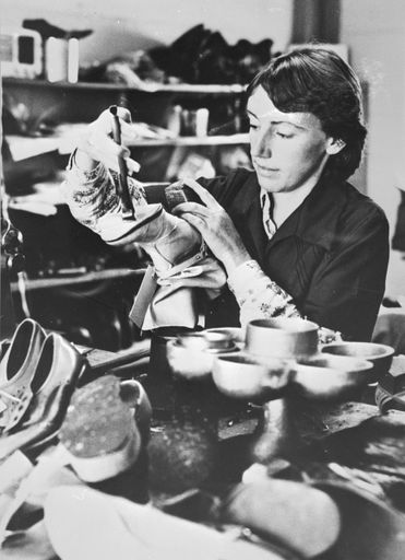 Repairing shoes at Eeyore's Cobblery shop, Featherston Street