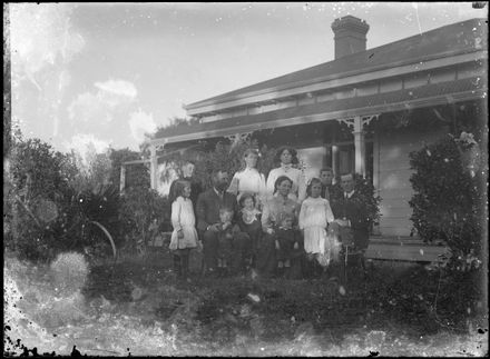 Family Group Outside Cottage