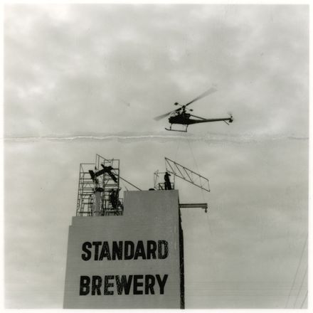 2021P_LionBreweries2-6-1_036069_003 - Helicopter Used in Installation of Standard Brewery Sign