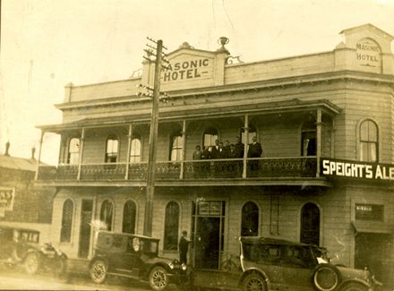 Group on the verandah of the Masonic Hotel