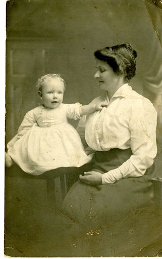 Woman and young child on postcard