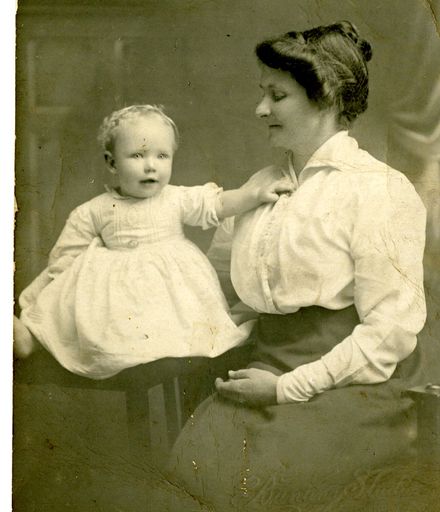 Woman and young child on postcard