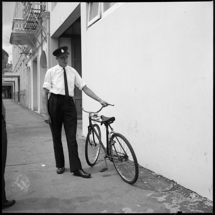 "Taken from Youths" Bicycle Held by Police Officer