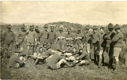 Soldiers undertaking training exercises watched by their colleagues