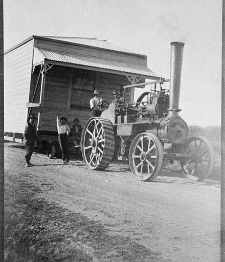 Traction Engine Hauling a section of a Farmhouse