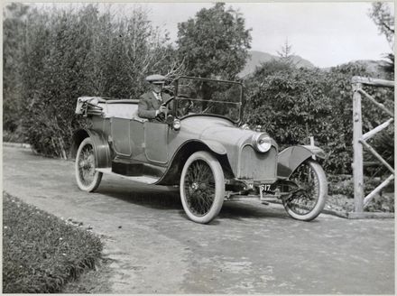 Arthur or Edwin (Ted) Akers in car,  Ashhurst district