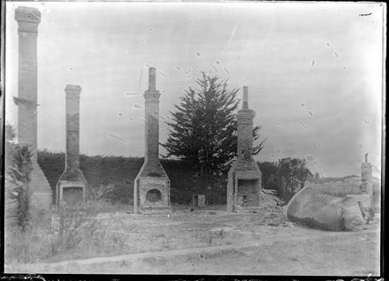 Chimneys from Demolished House Left Standing
