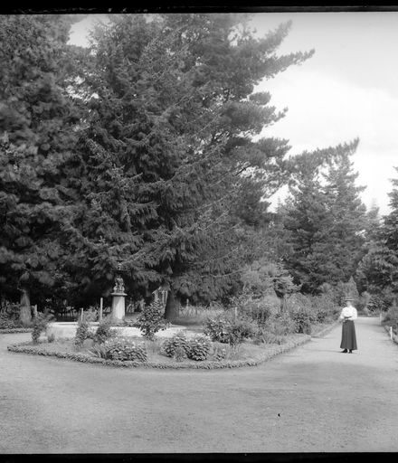 Woman Walks through Garden - Albert Park
