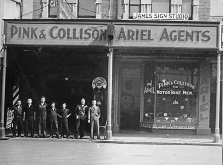 Staff outside Pink and Collison, Motor Cycle Agents, Cuba Street
