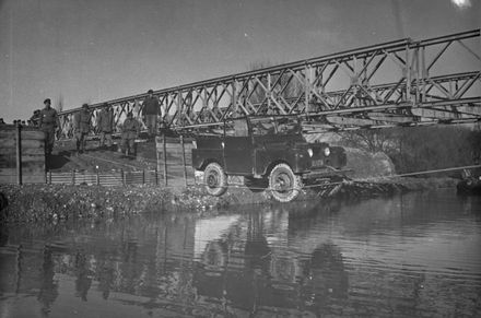 Army land rover crossing water on a 'Millar Bridge'