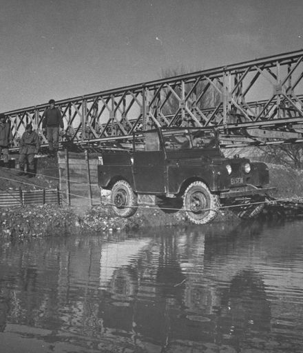 Army land rover crossing water on a 'Millar Bridge'
