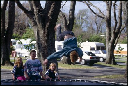Children Play on Trampoline