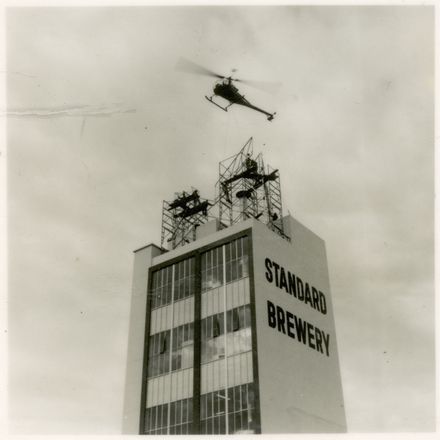 2021P_LionBreweries2-6-1_036069_009 - Helicopter Used in Installation of Standard Brewery Sign