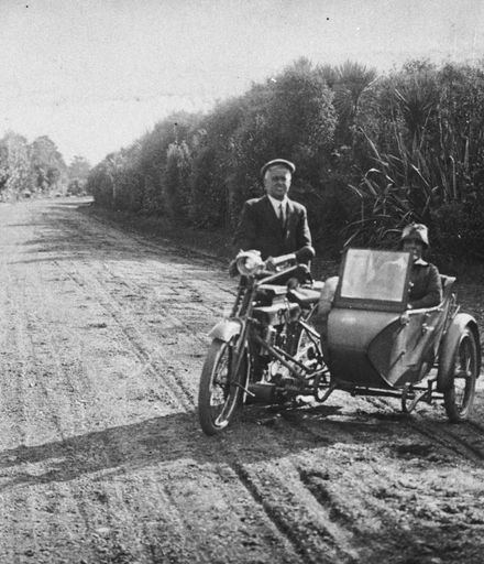 Cycle and motor bike with sidecar on Victoria Drive, Victoria Esplanade