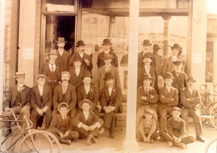 Workmen outside Ward Bros building