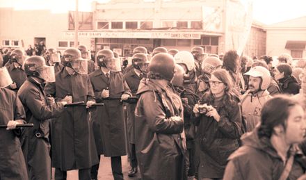 Protesters challenge police lines