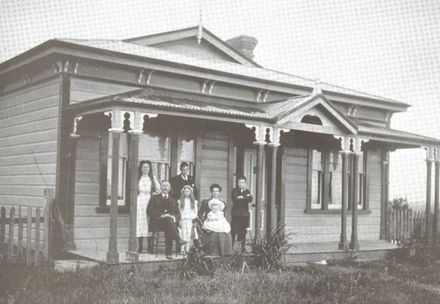 MOODY family outside house